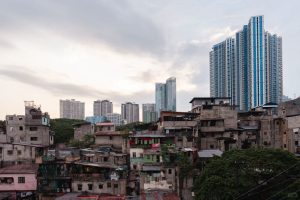 Contrasting neighborhoods in Manila with older housing and modern towers