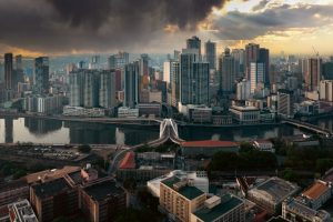 Manila cityscape with river and high-rise buildings