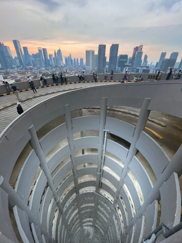 Jakarta city view from an upper-level parking deck