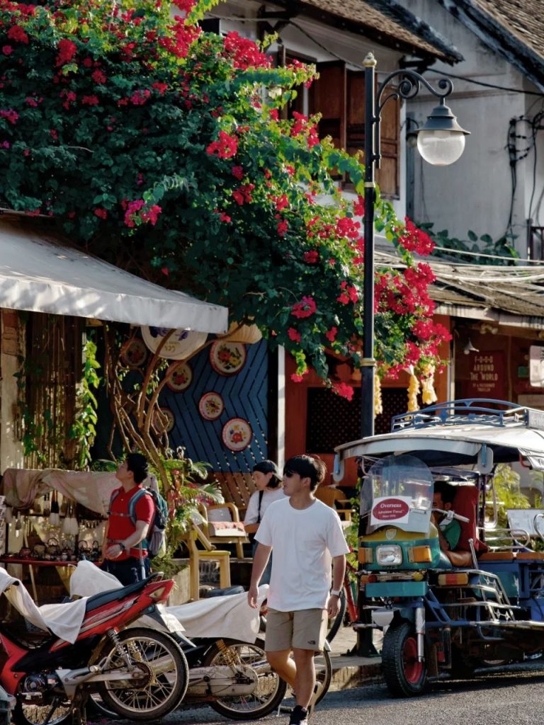 Local street with tuk tuk in Luang Prabang Laos